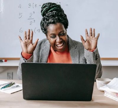 Photo by Katerina Holmes from Pexels: https://www.pexels.com/photo/happy-black-woman-using-laptop-for-online-work-5905713/